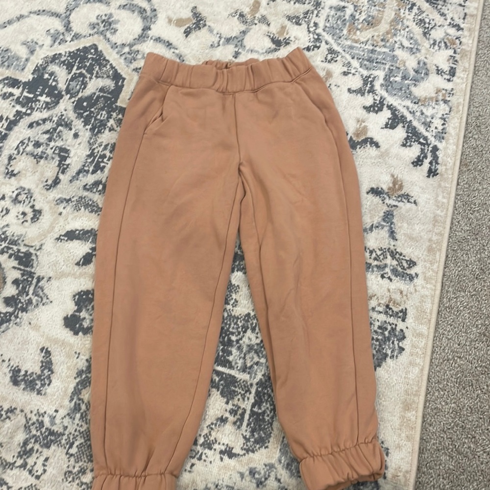 a•new day rust colored sweat pants, size xs